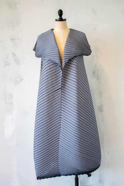 MC Oasis; Pleated Vest