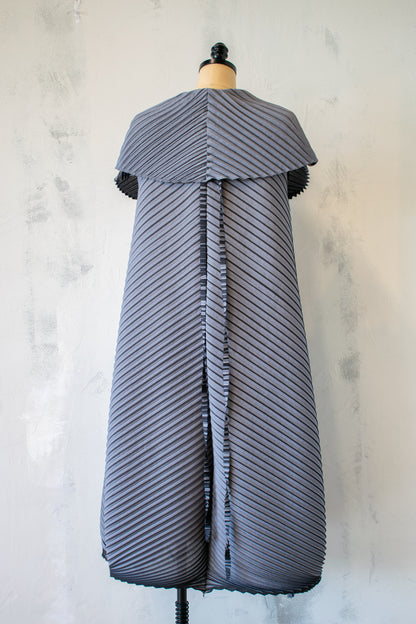 MC Oasis; Pleated Vest